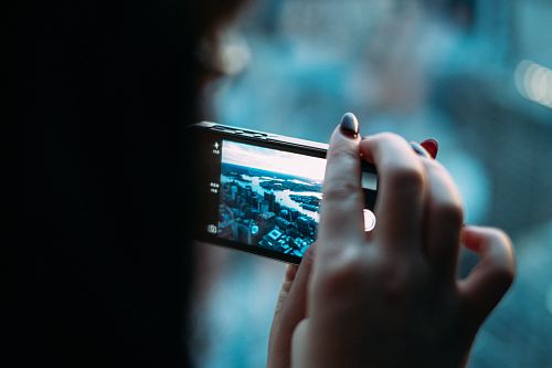 person holding black smartphone