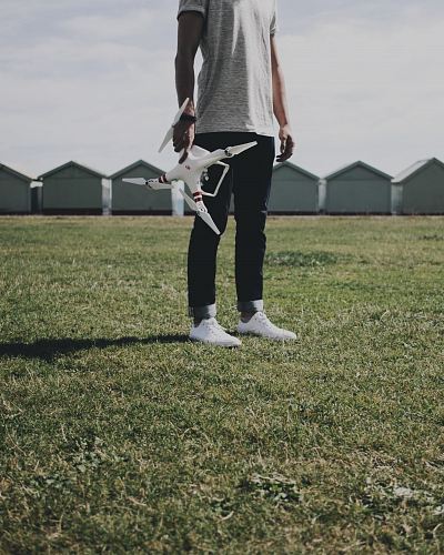person holding DJI Phantom 3 Standard