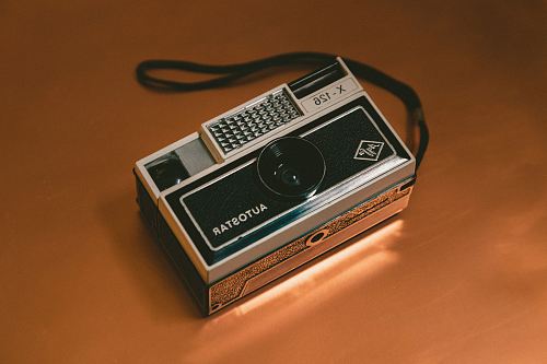 photo of gray and black X-216 camera