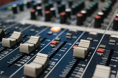 selective focus photo of DJ mixer