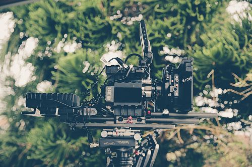selective focus photography of black device component