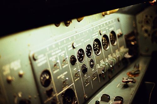 selective focus photography of grey electronic control panel