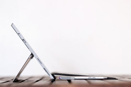 stylus pen in front of table computer