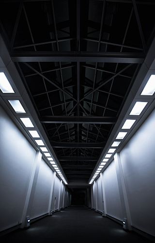 white and gray concrete hallway