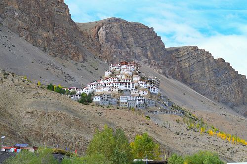white painted building on high ground