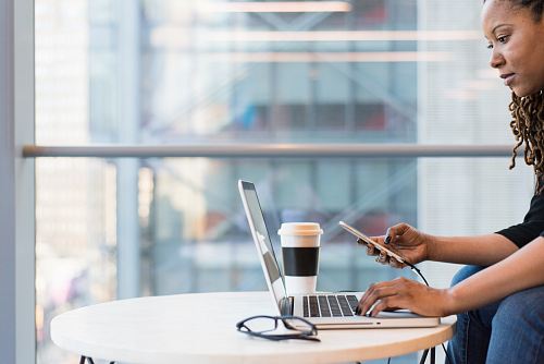 woman using MacBook