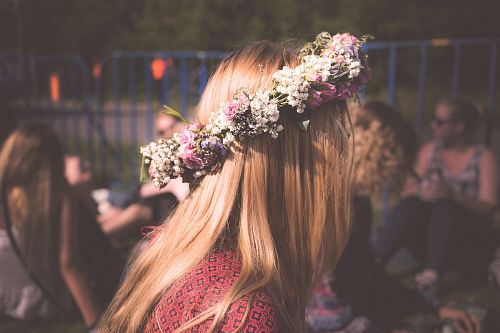 woman wearing floral accent top