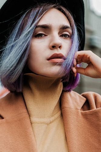 woman with blue and purple ombre hair dye