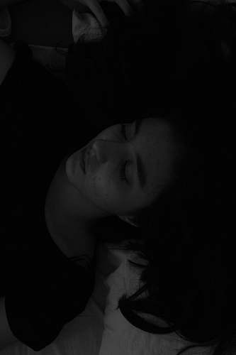 human grayscale photo of womans face black