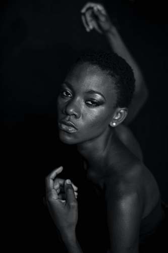 human topless man with black background person