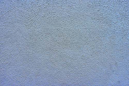 slate blue and white painted wall asphalt