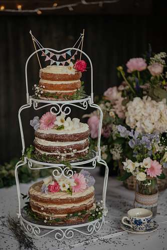 flora three cakes on white wire cake rack jar