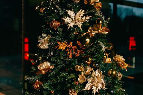 gold Christmas tree with decors holiday
