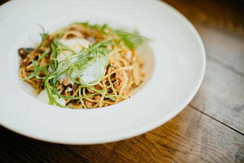 plant cooked dish on ceramic plate bean sprout