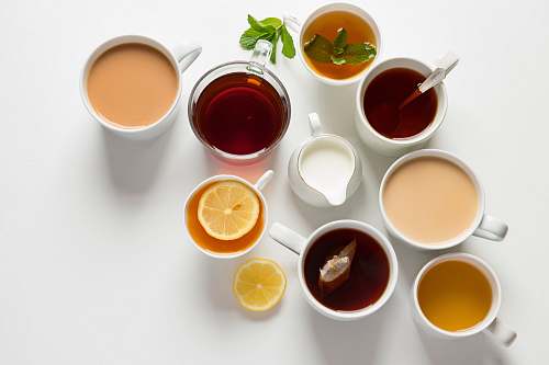 tea flat-lay photography of variety of beverage filled glasses drink