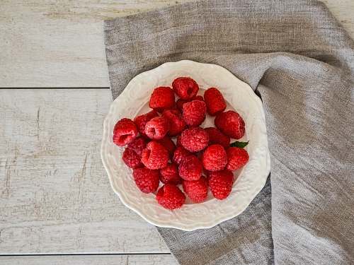 fruit red berries on plate raspberry
