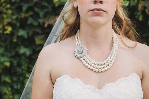 person woman in white bridal gown wedding dress