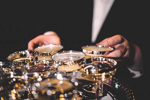 ornament person standing beside martini glasses bling