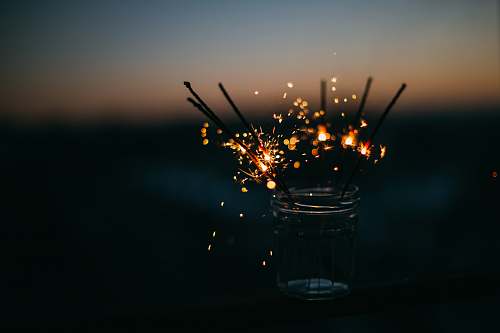 sparkler sparkler on jar outdoors