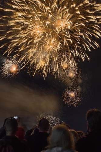 fireworks people watching fireworks at nighttime people