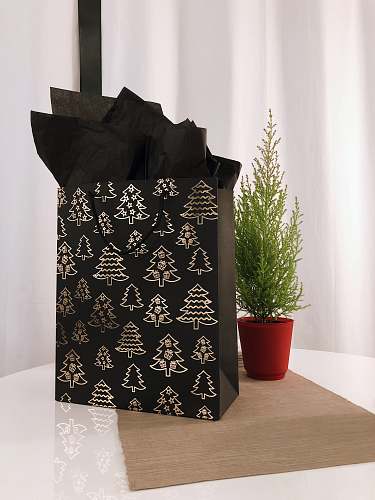 pot black and gray paper bag on table jar