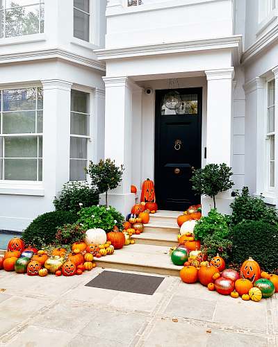 pumpkin pumpkin decorations near house vegetable