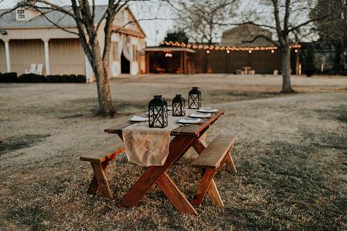 chair rectangular brown wooden picnic table on the field furniture