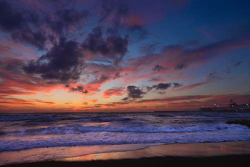 sunrise ocean waves near seashore during golden hour sky