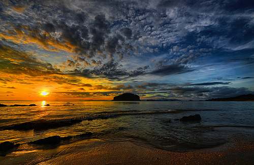 water sunset under beach sea