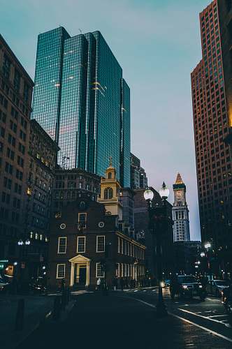 road black high buildings at nighttime urban