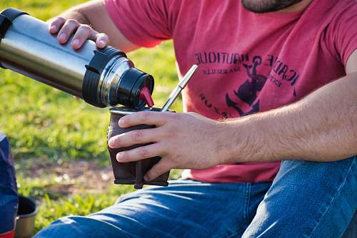 person man pouring on mug human