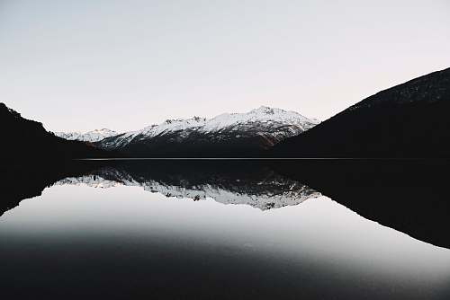 nature grayscale photo of mountain mountain