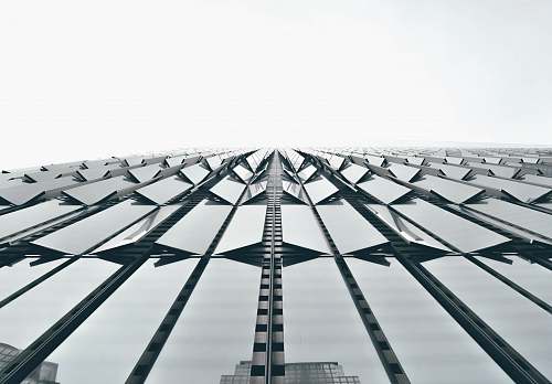 architecture low angle photography of clear glass architectural design skyscraper