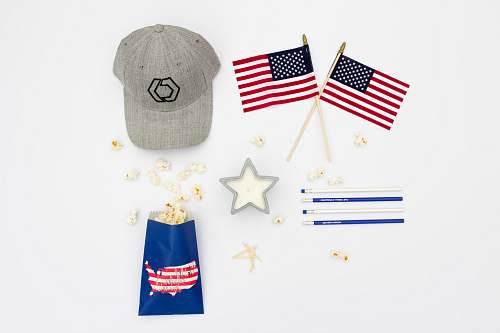 popcorn two U.S.A. flaglets with gray fitted cap and popcorn snack