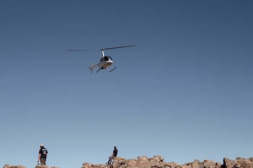 vehicle white helicopter under blue sky transportation