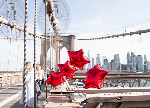 person four red star balloons apparel