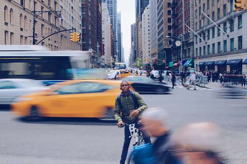 car man wearing olive green jacket people