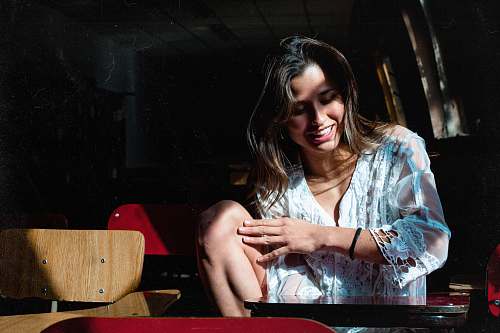 person woman in teal and white dress argentina