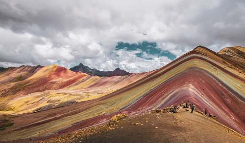 nature mountain under gray clouds outdoors