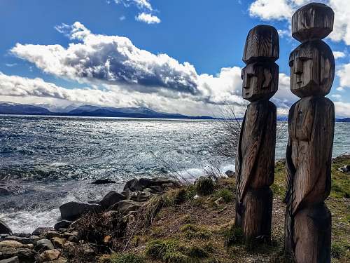 building photo of wooden tribal statue architecture