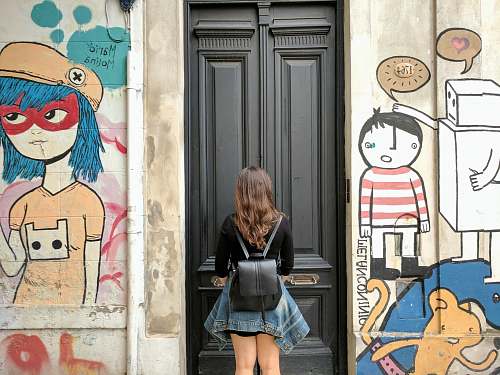 human woman wearing black leather knapsack people