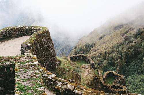 landscape green grass mountain with fog ancient