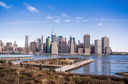 water aerial photography of New York City skyline during daytime waterfront