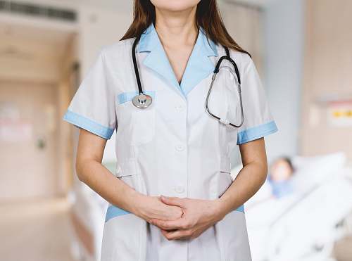 doctor woman in white button up shirt and blue stethoscope person