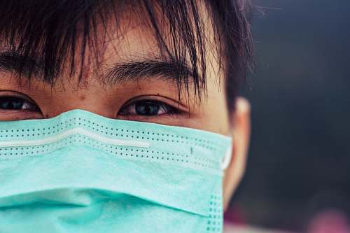 human person with white face mask doctor