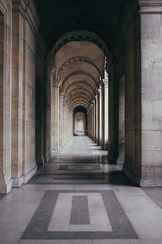  photo of gray hallway during daytime 