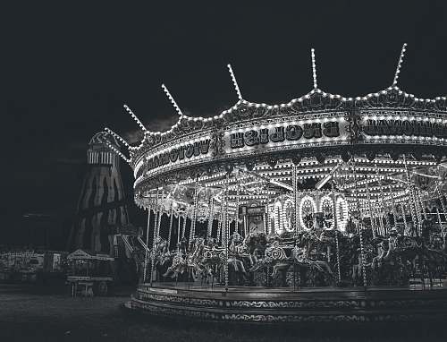 carousel grayscale photo of carousel arena