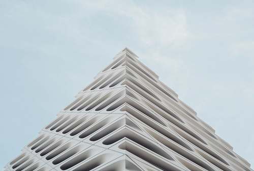 architecture low angle photography of building grey