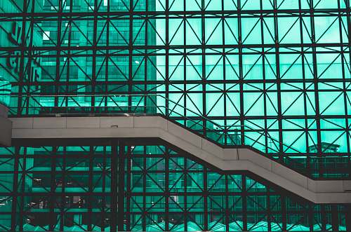 staircase photography of white bridge in building repetition