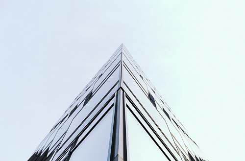 berlin The corner of an all glass building in Berlin germany